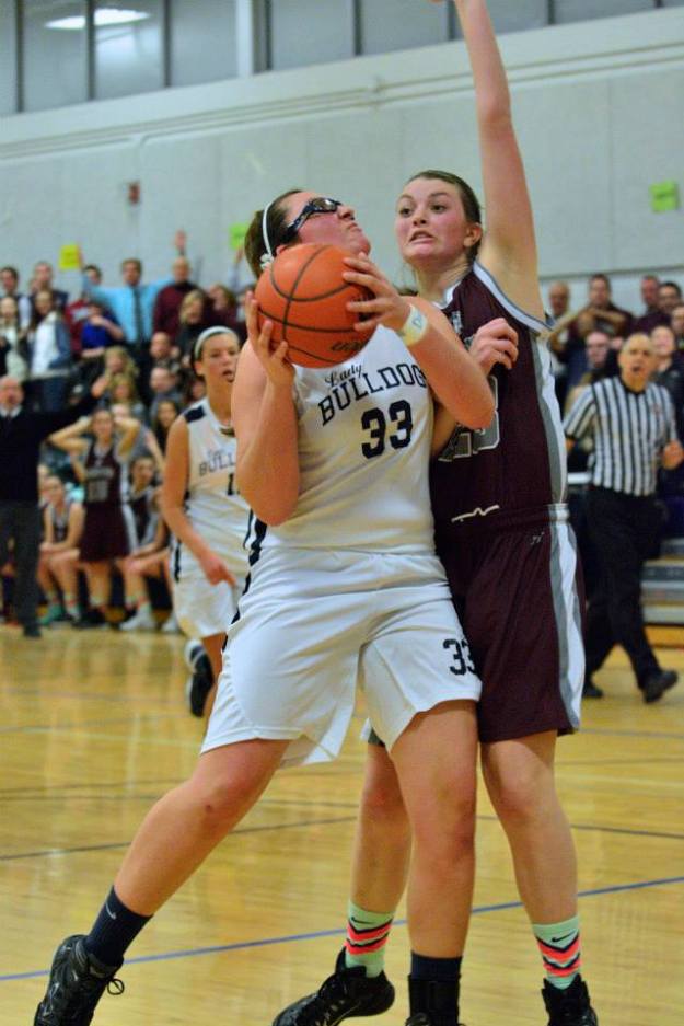 Junior Caroline Kilduff was a force on the boards against Bishop Stang.  photos Rockland High Sports